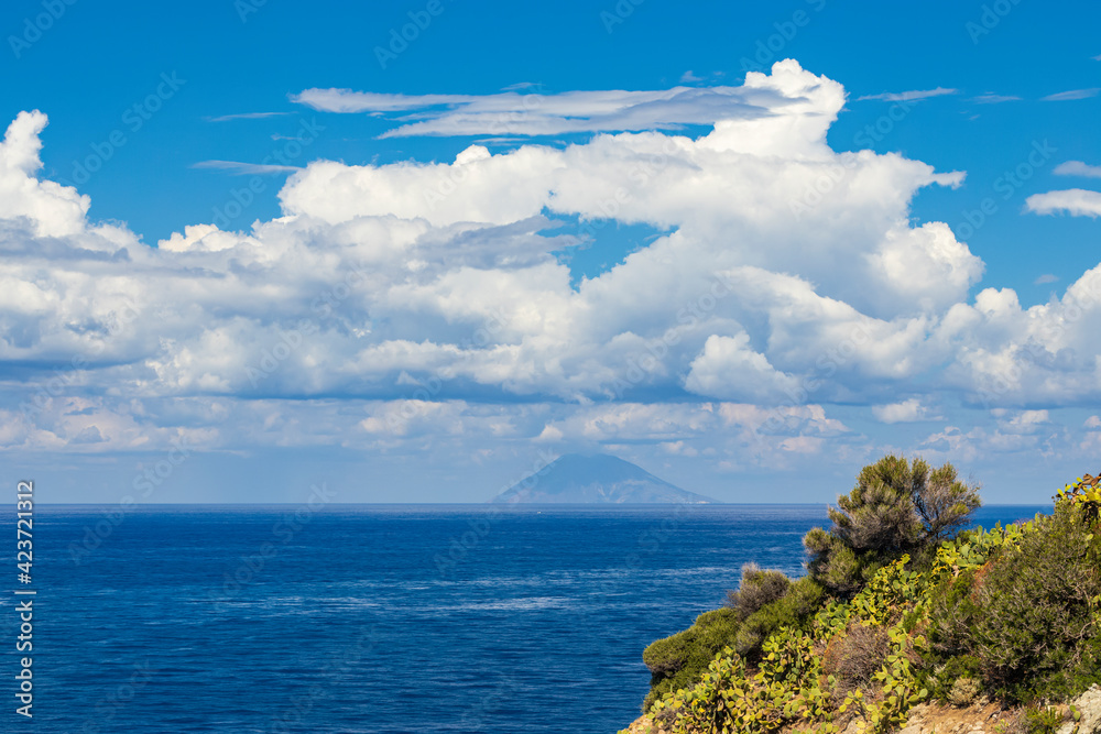 Rock cliff of cape Capo Vaticano with Aeolian Islands, Tyrrhenian Sea, Calabria, Southern Italy