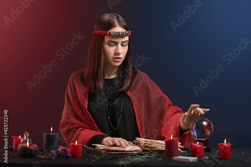 Female fortune teller reading future photo