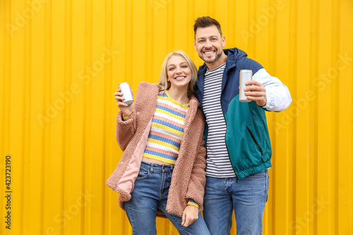 Young couple with soda on c...