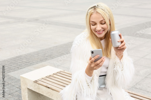 Beautiful young woman with ...