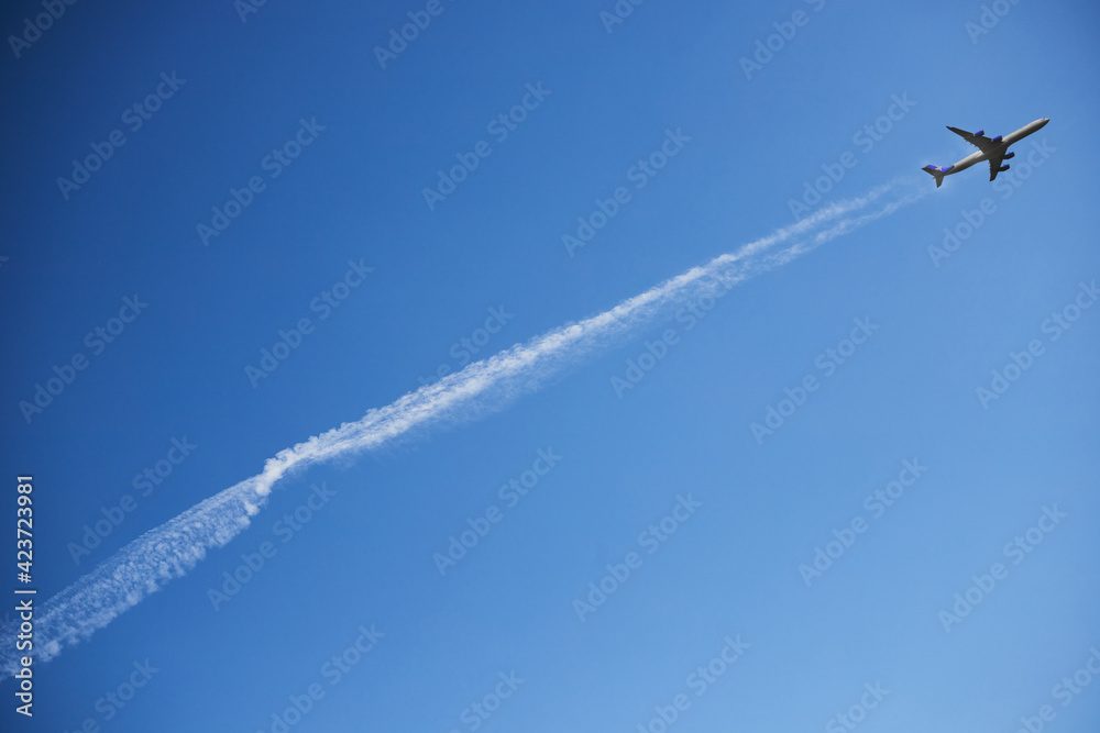 the plane in the clear sky takes off leaving the line the plane in the clear sky takes off leaving the line