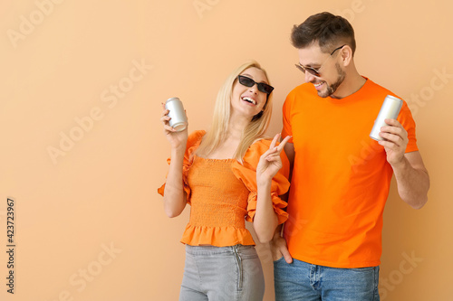 Couple with soda on color b...