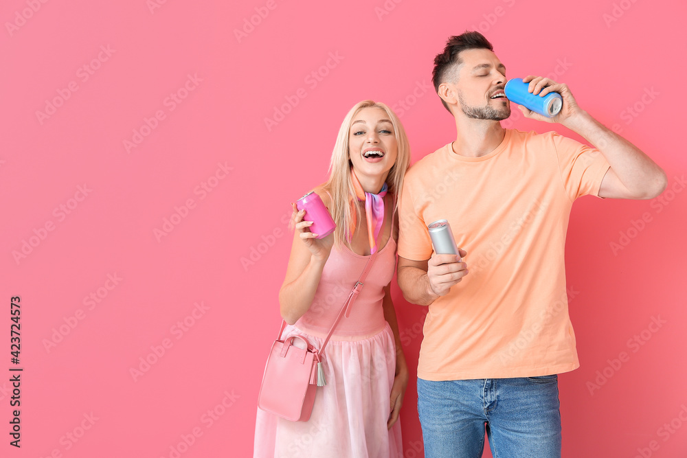 Couple with soda on color background Couple with soda on color background