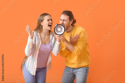 Emotional young couple with...