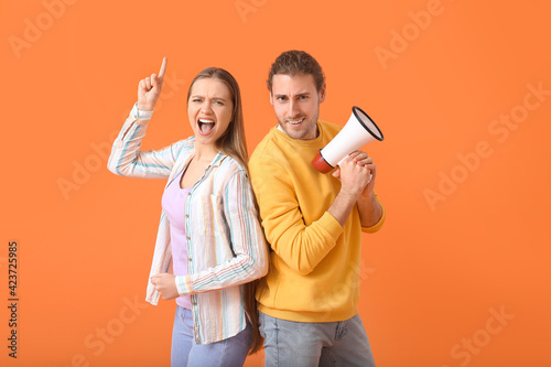 Emotional young couple with...