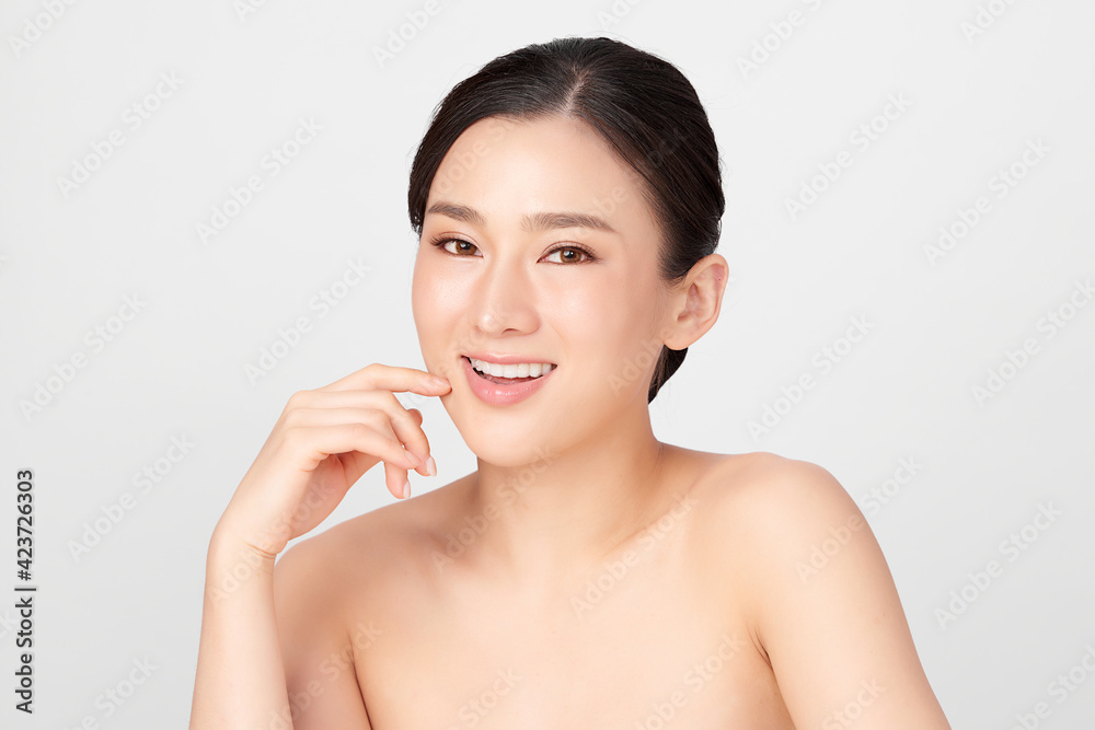 Beautiful young asian woman with clean fresh skin on white background, Face care, Facial treatment, Cosmetology, beauty and spa, Asian women portrait Beautiful young asian woman with clean fresh skin on white background, Face care, Facial treatment, Cosmetology, beauty and spa, Asian women portrait