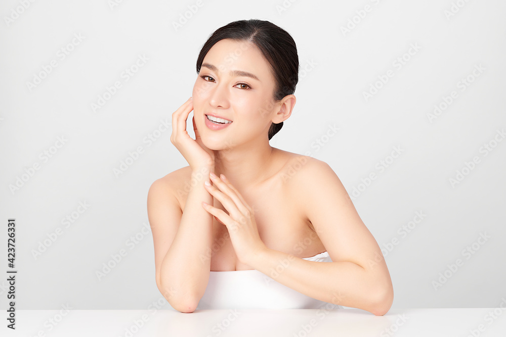 Beautiful young asian woman with clean fresh skin on white background, Face care, Facial treatment, Cosmetology, beauty and spa, Asian women portrait Beautiful young asian woman with clean fresh skin on white background, Face care, Facial treatment, Cosmetology, beauty and spa, Asian women portrait