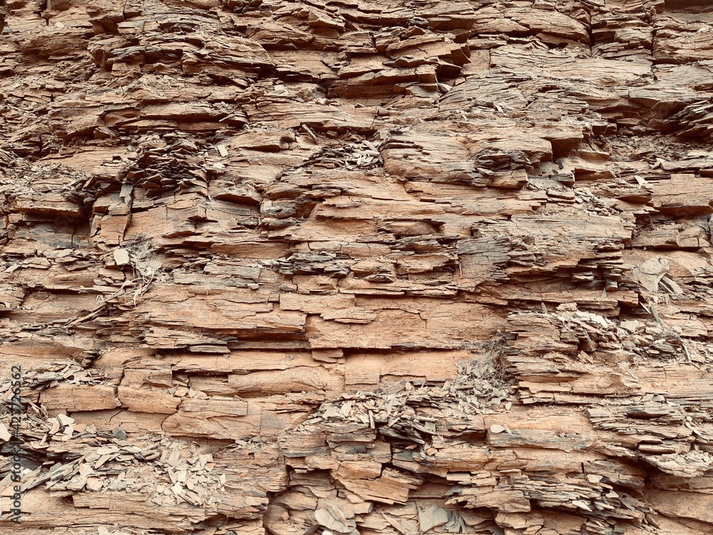 Obraz premium Natural stone Texture of the sedimentary rock. Stone wall layers of Geological photo texture