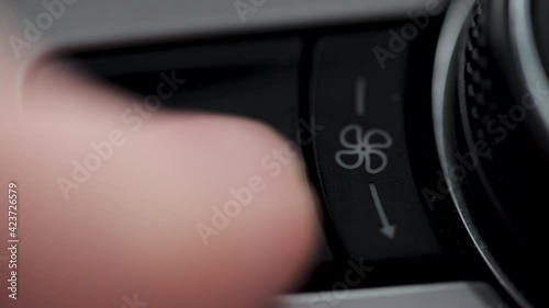 Button to switch on the autonomous heater in the car. Finger press the button to start the autonomous heater webasto photo