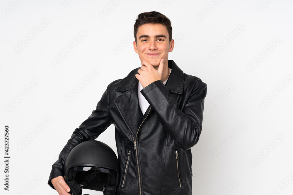 Man holding a motorcycle helmet isolated on white background laughing Man holding a motorcycle helmet isolated on white background laughing