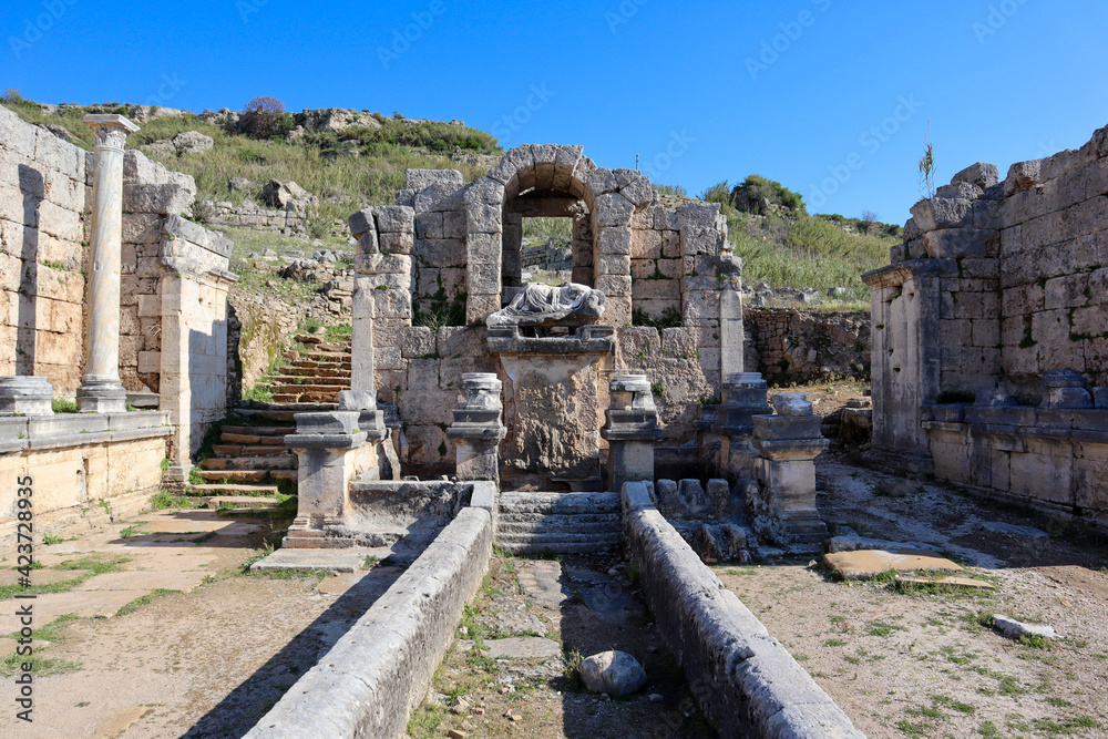 ruins of Nymphaeum in archaeological site ancient city Perge, near Antalya, Turkey