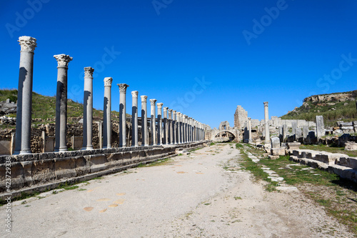 beautiful colonnade on the street of ancient ruined city Perge, near Antalya