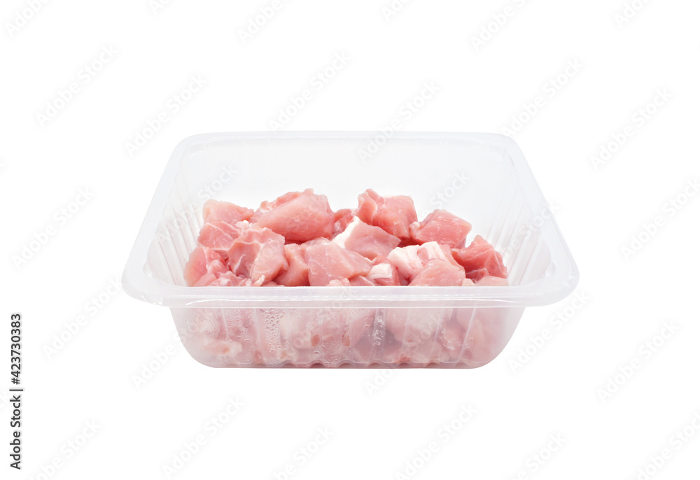 Raw pork meat in a plastic container isolated on white background. pieces of fresh meat. Raw pork meat in a plastic container isolated on white background. pieces of fresh meat.