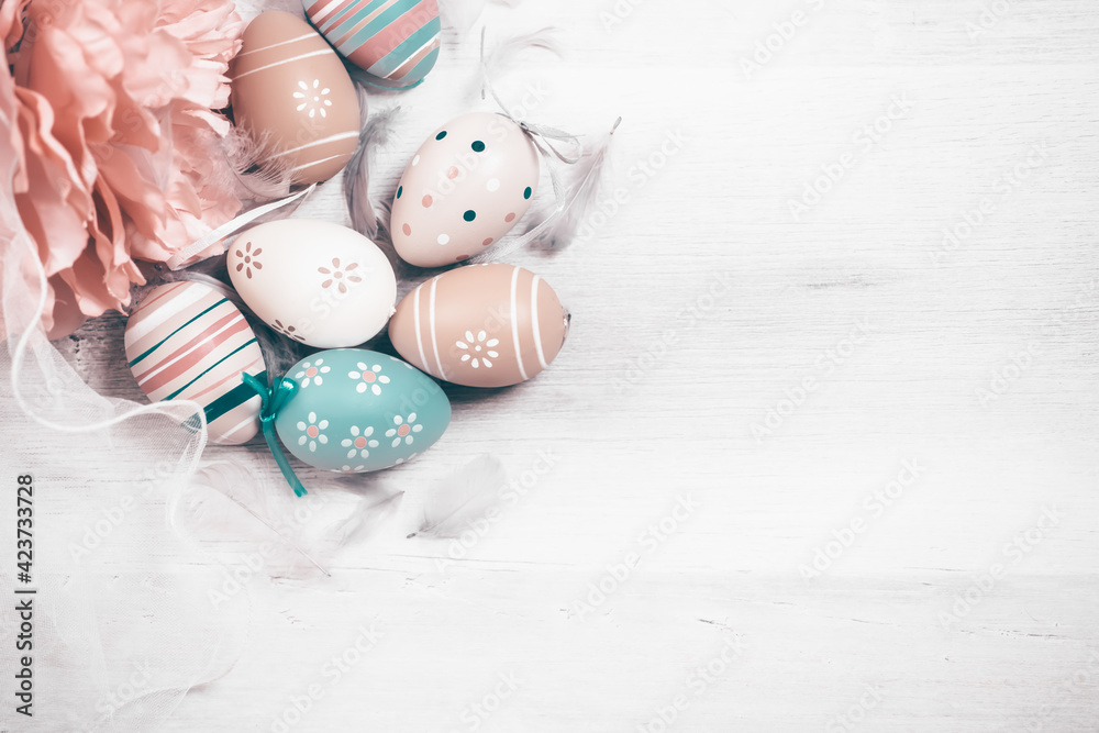 Easter background with Easter eggs. Top view with copy space. - obrazy, fototapety, plakaty 
