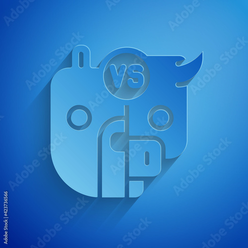 Paper cut Bull and bear symbols of stock market trends icon isolated on blue background. The growing and falling market. Wild Animals. Paper art style. Vector