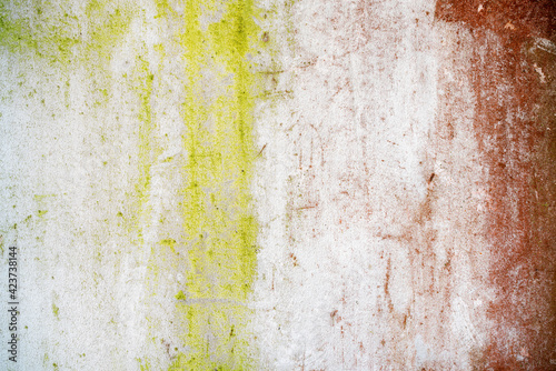 Stains on the old wall appears a vintage color style, pattern and texture.