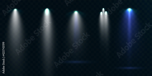 Spotlights set isolated on transparent background. Vector glowing light effect with golden rays and lens flares. 