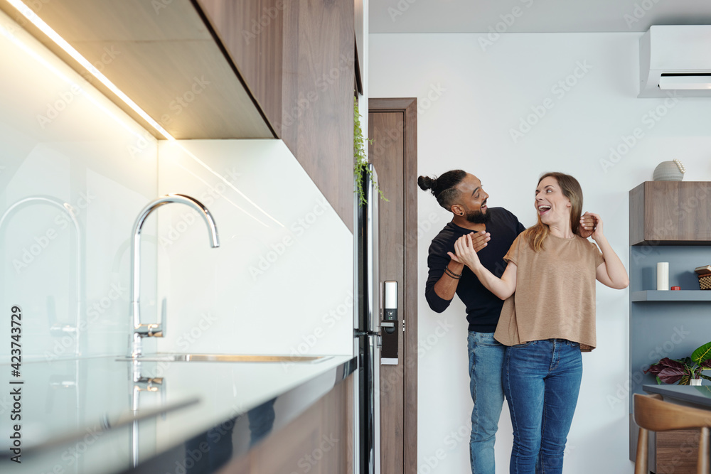 Happy excited young woman surprised with new apartment her husband bought or rented for them Happy excited young woman surprised with new apartment her husband bought or rented for them
