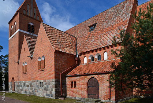 Photography brick neo-gothic Catholic church of Our Lady of Gietrzwałd, erected at the begin