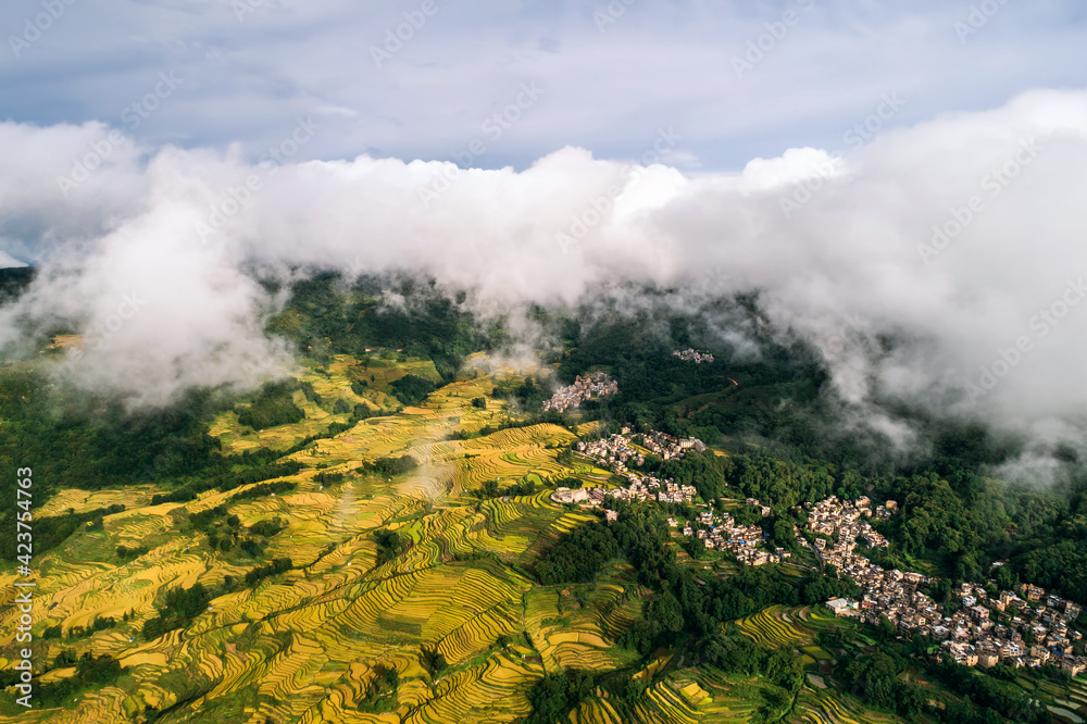 Aerial view of farmland and cloudscape of Yuanyang Terrace Scenic Area