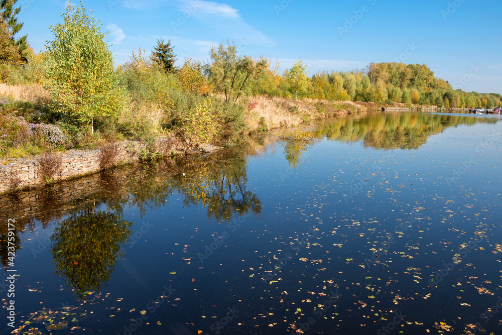 View of the water channel on an autumn sunny day
