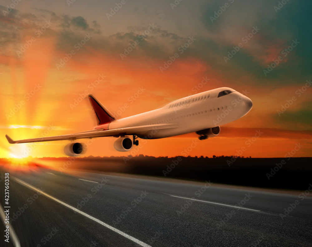 Modern white airplane landing on runway Modern white airplane landing on runway