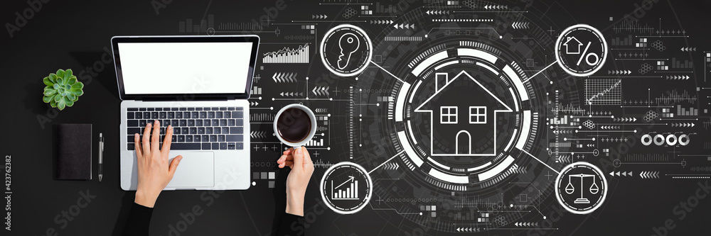 Real estate theme with person using laptop computer Real estate theme with person using laptop computer