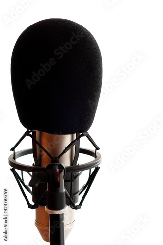 Close up of microphone in studio room, isolated on white