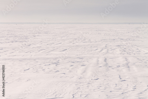 natural background winter minimalism, snow field turning into the sky