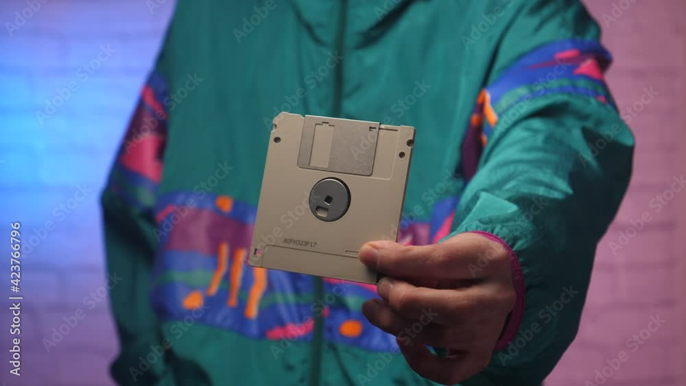 Showing a diskette floppy disk up close. 80s 90s style