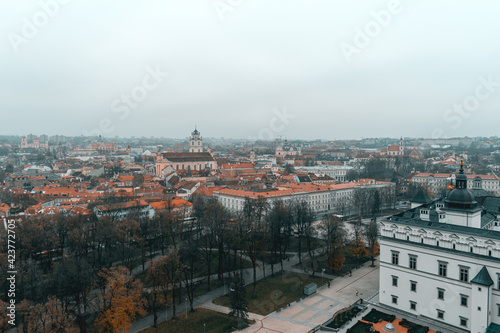Aerial shot of the main square with the Palace of the Grand Dukes of Lithuania in Vilnius, Lithuania during gloomy winter day