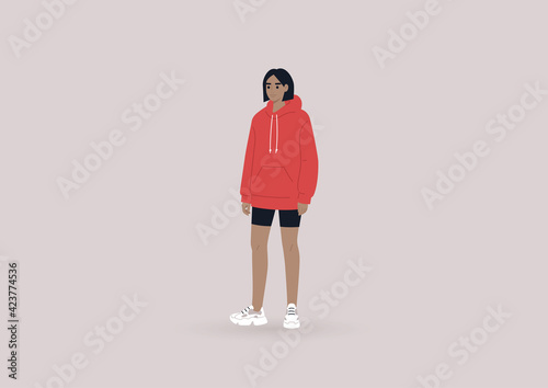 A young female character wearing a hoodie and black cycling shorts, a streetwear concept