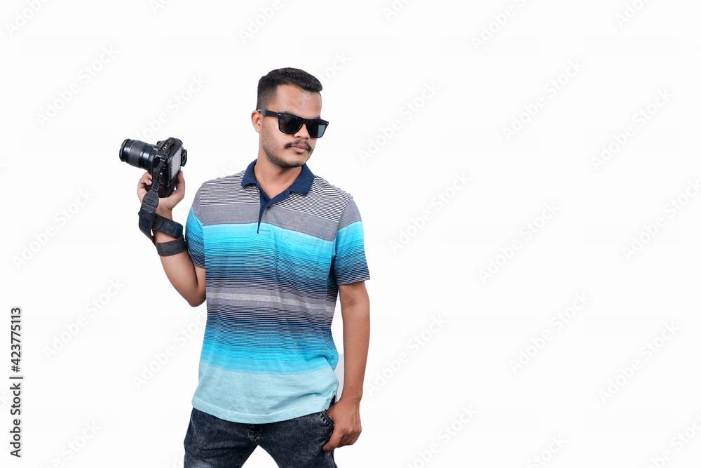 Young man taking a photo with a professional camera. Front view. Over white, all angel poses Young man taking a photo with a professional camera. Front view. Over white, all angel poses