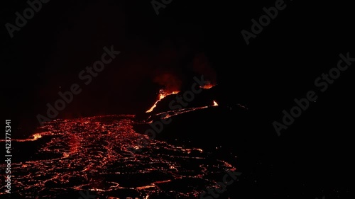 Natural disaster in Iceland with Fagradalsfjall volcano erupting at night, 2021 photo