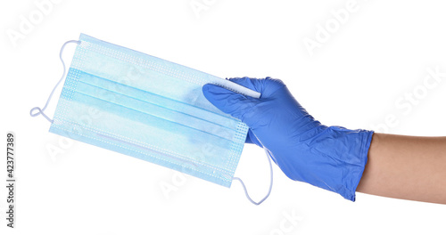 Medical worker hand in blue...
