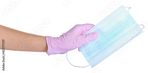 Female hand in protective glove with medical mask on white background