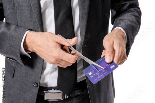 Businessman cutting credit ...