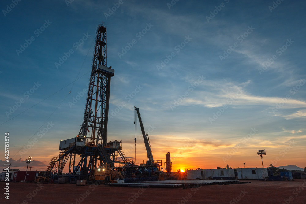 Onshore drilling rig in oil field, Petroleum industry Onshore drilling rig in oil field, Petroleum industry