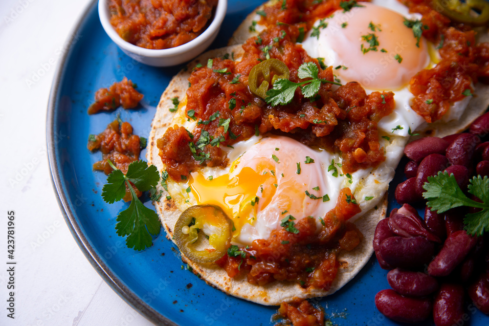 Huevos rancheros with red beans Huevos rancheros with red beans