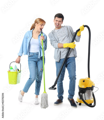 Young couple with cleaning ...