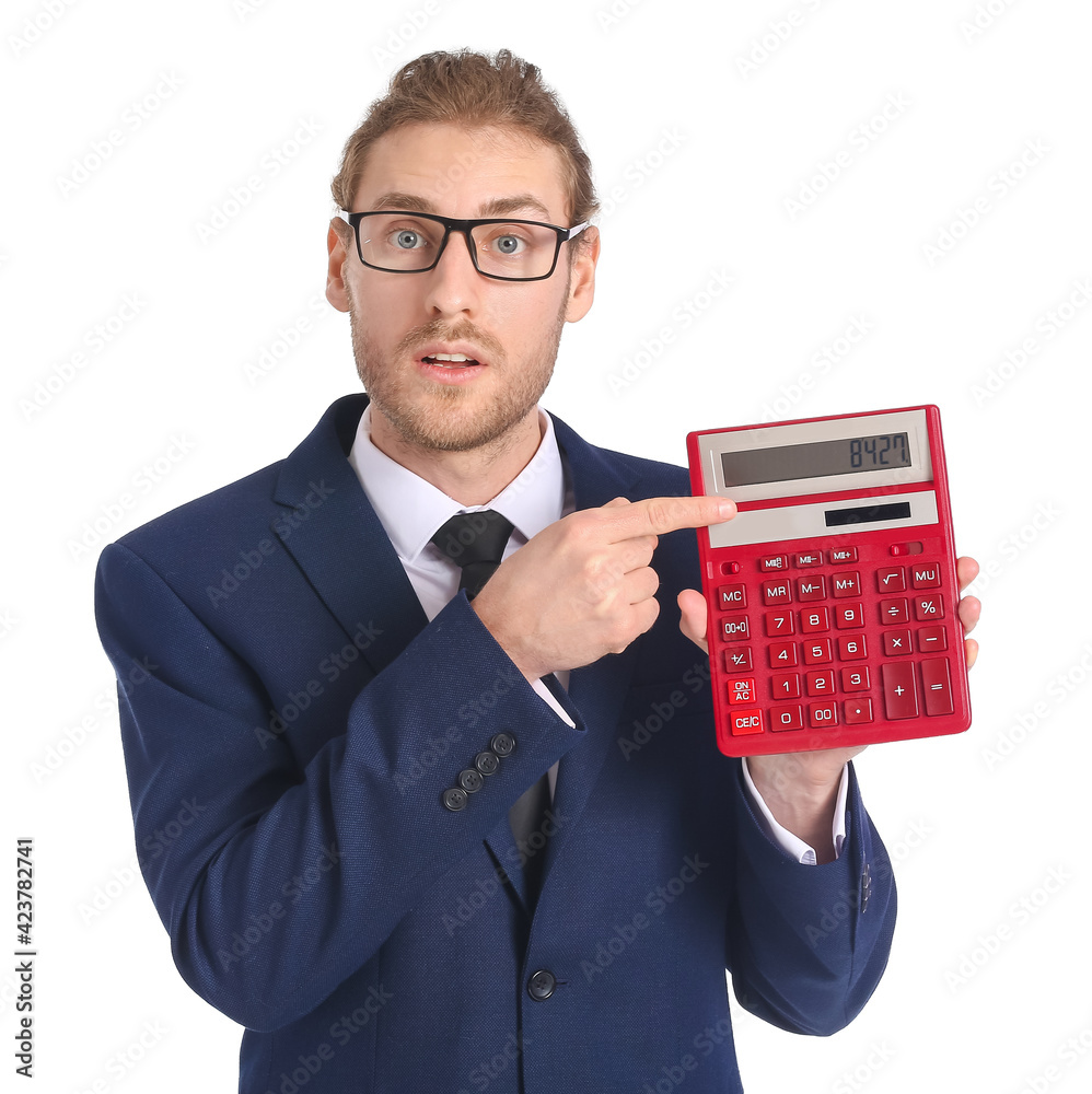 Young businessman with calculator on white background Young businessman with calculator on white background