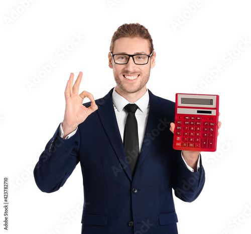 Young businessman with calc...