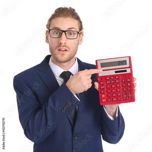 Young businessman with calc...