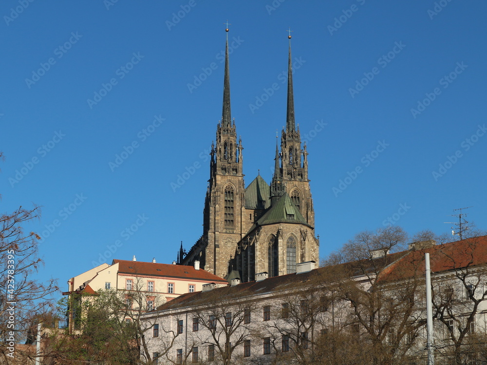 A low angle view to the Cathedral of St. Peter and Paul with blue sky in background and Brno, Czech republic