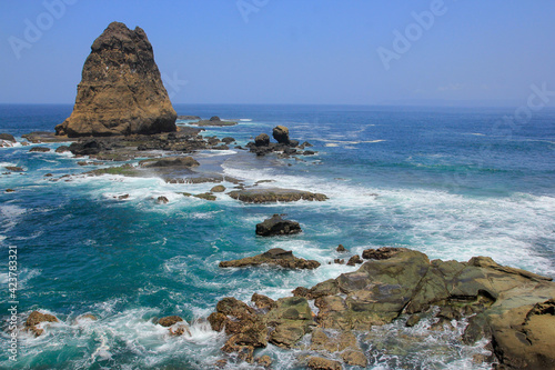 Iconic shark-shaped coral reef of Tanjung Papuma beach Jember, East Java, Indonesia. photo