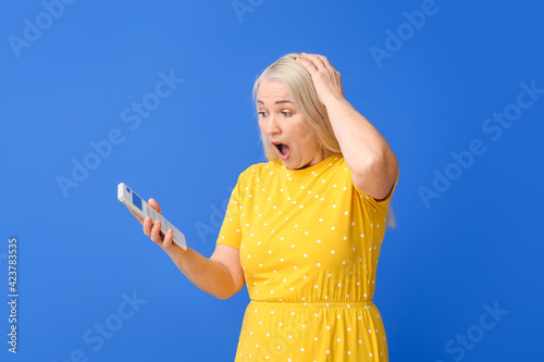 Stressed mature woman with ...
