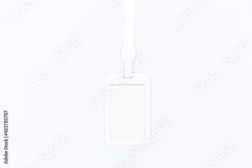 Clear plastic badge id card with white neck lanyard isolated on white background