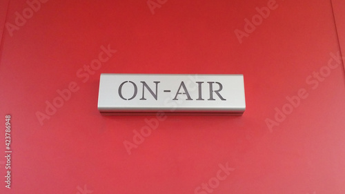 ON-AIR sign on the wall