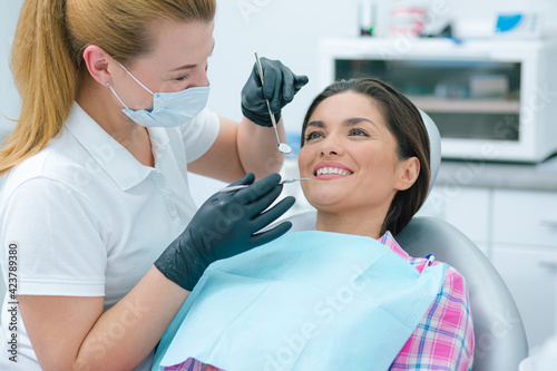 Wallpaper Mural Mirthful woman with her reliable medical specialist Torontodigital.ca