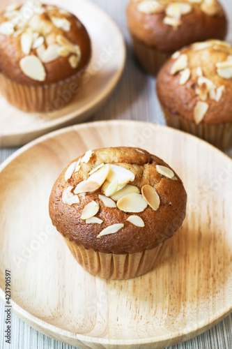 Close up of banana muffin almond in a wooden plate, an optional vegan dessert for a healthy diet and low carb